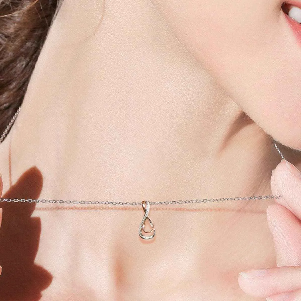 Elegant Moissanite Infinity Pendant